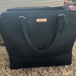 Black Kate Spade purse with crossbody strap and handles